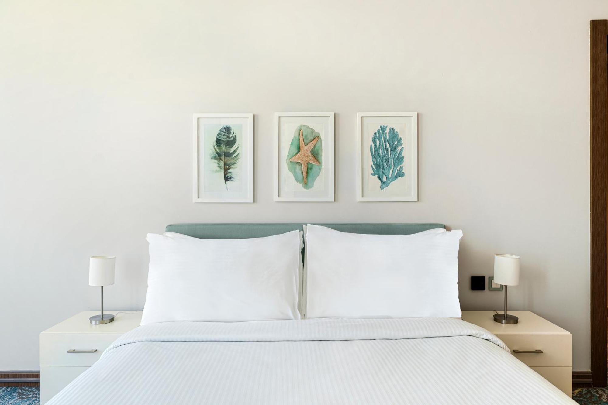 Rixos Premium Alamein El Alamein Rom bilde A bedroom at the hotel